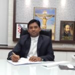 Fr. Roshan Bage sj